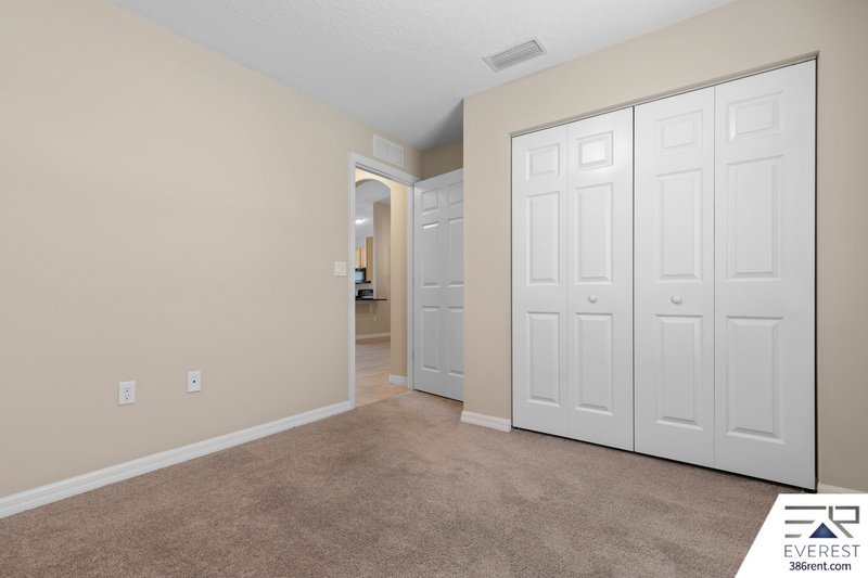 FULLY FENCED, LIKE NEW 3/2/1 IN DESIRABLE MATANZAS WOODS property image