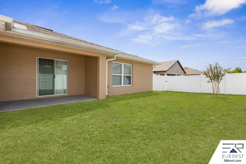 FULLY FENCED, LIKE NEW 3/2/1 IN DESIRABLE MATANZAS WOODS property image