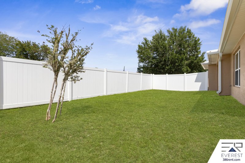 FULLY FENCED, LIKE NEW 3/2/1 IN DESIRABLE MATANZAS WOODS property image