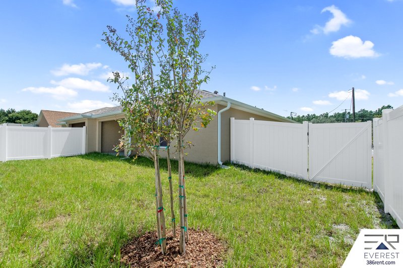 FULLY FENCED 3/2/1 IN DESIRABLE MATANZAS WOODS property image