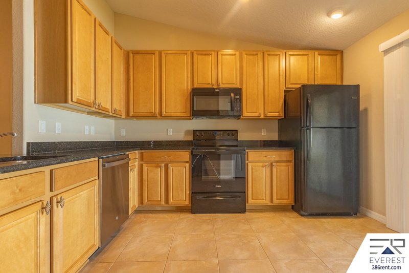 FULLY FENCED 3/2/1 IN DESIRABLE MATANZAS WOODS property image