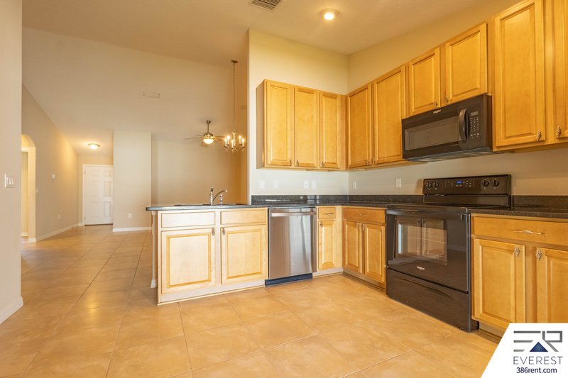 FULLY FENCED 3/2/1 IN DESIRABLE MATANZAS WOODS property image