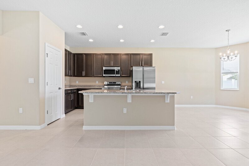 FULLY FENCED, LIKE NEW 3/2/2 IN DESIRABLE PINE GROVE property image