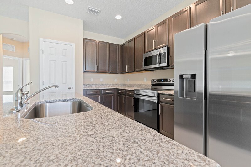 FULLY FENCED, LIKE NEW 3/2/2 IN DESIRABLE PINE GROVE property image