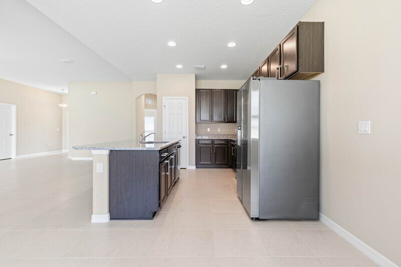 FULLY FENCED, LIKE NEW 3/2/2 IN DESIRABLE PINE GROVE property image