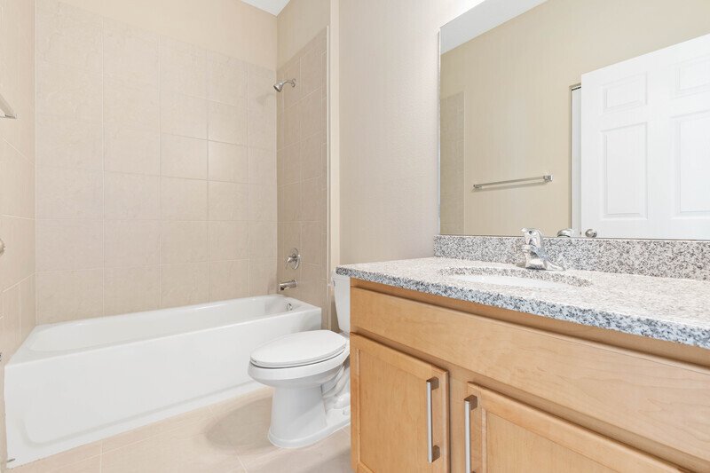 FULLY FENCED, LIKE NEW 3/2/2 IN DESIRABLE PINE GROVE property image