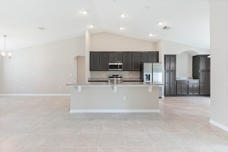 FULLY FENCED, LIKE NEW 4/2/2 IN DESIRABLE PINE LAKES property image