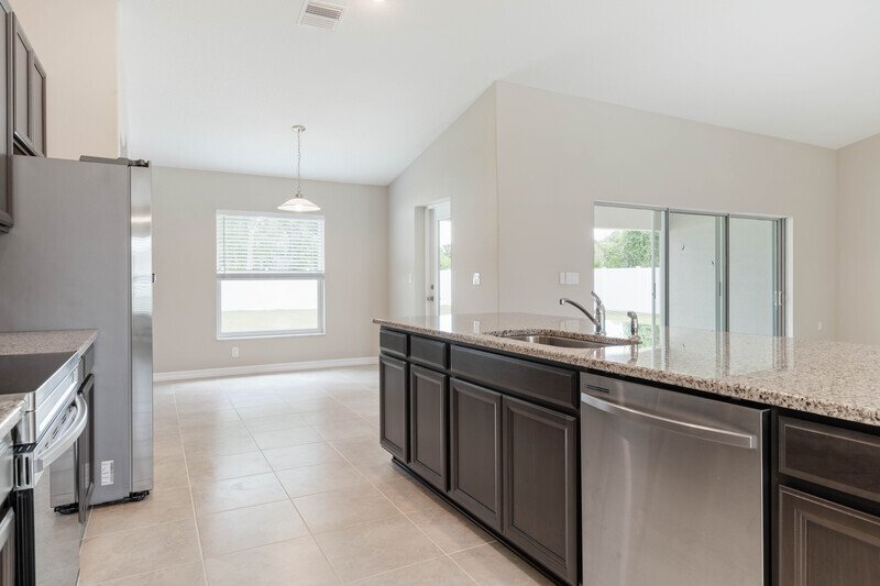 FULLY FENCED, LIKE NEW 4/2/2 IN DESIRABLE PINE LAKES property image