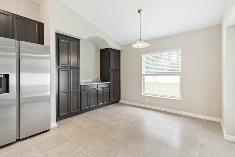 FULLY FENCED, LIKE NEW 4/2/2 IN DESIRABLE PINE LAKES property image