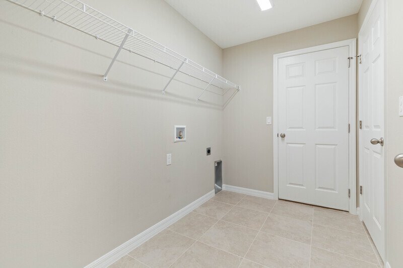 FULLY FENCED, LIKE NEW 4/2/2 IN DESIRABLE PINE LAKES property image
