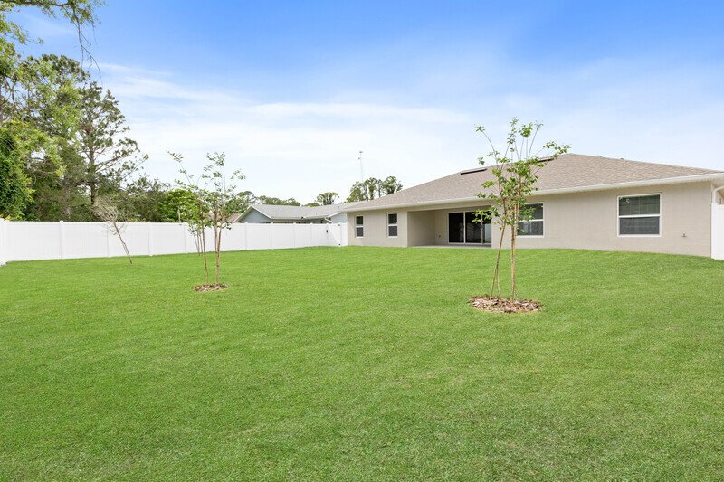 FULLY FENCED, LIKE NEW 4/2/2 IN DESIRABLE PINE LAKES property image