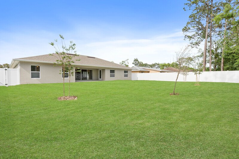 FULLY FENCED, LIKE NEW 4/2/2 IN DESIRABLE PINE LAKES property image