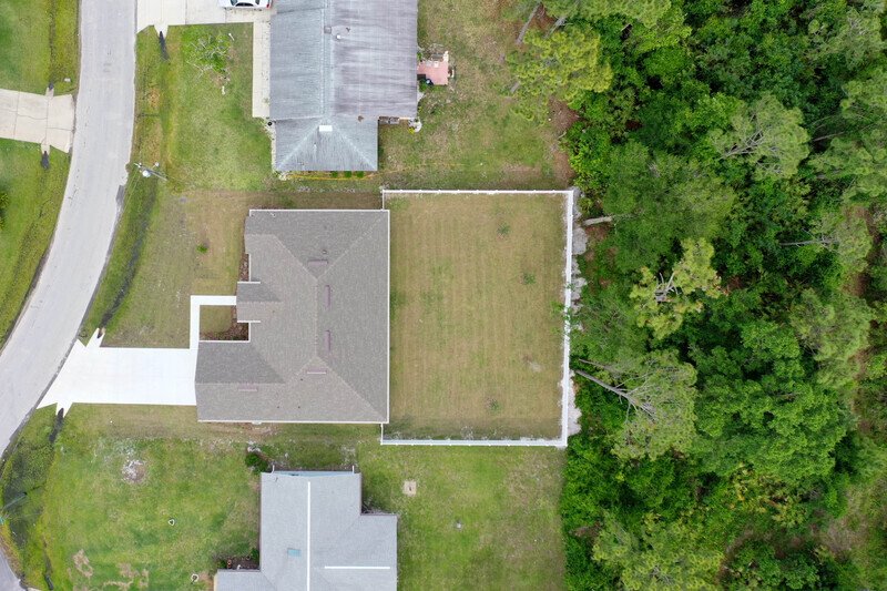 FULLY FENCED, LIKE NEW 4/2/2 IN DESIRABLE PINE LAKES property image