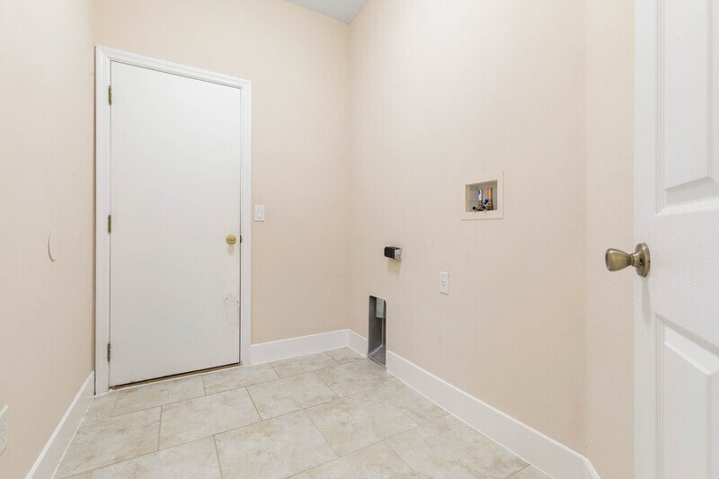 FULLY FENCED, SPACIOUS 3/2/2 ON A CUL DE SAC IN POPULAR LEHIGH WOODS property image