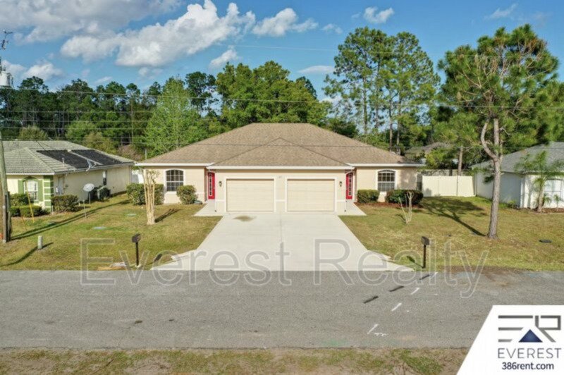 FULLY FENCED 3/2/2 TOWN HOME IN THE HEART OF PALM COAST property image