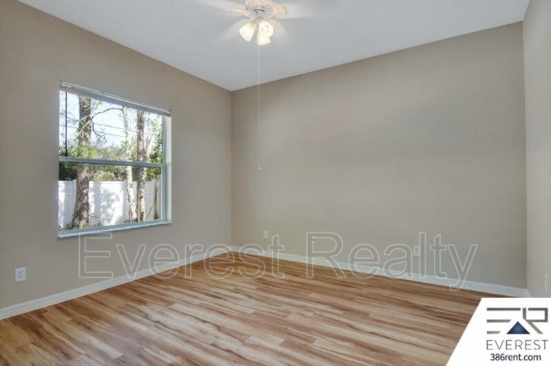 FULLY FENCED 3/2/2 TOWN HOME IN THE HEART OF PALM COAST property image