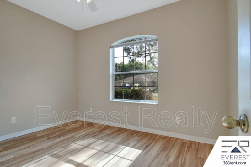 FULLY FENCED 3/2/2 TOWN HOME IN THE HEART OF PALM COAST property image