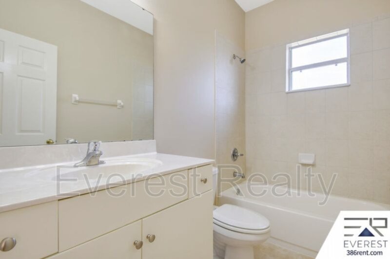 FULLY FENCED 3/2/2 TOWN HOME IN THE HEART OF PALM COAST property image