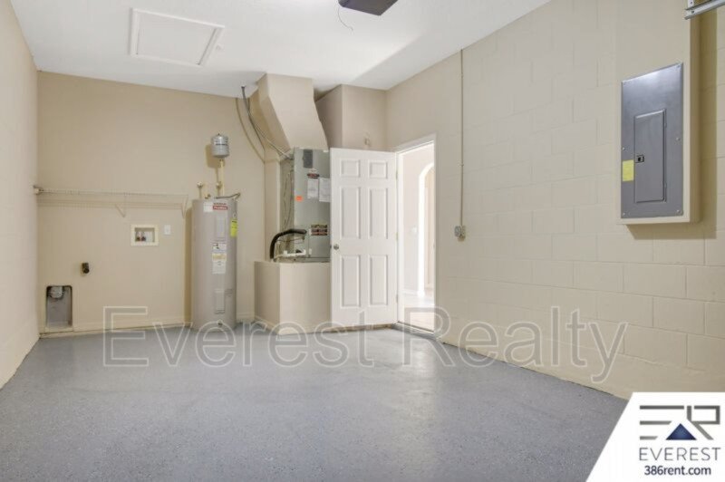 FULLY FENCED 3/2/2 TOWN HOME IN THE HEART OF PALM COAST property image