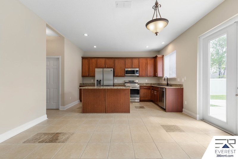 FULLY FENCED 5/2.5/2 IN DESIRABLE MATANZAS WOODS property image