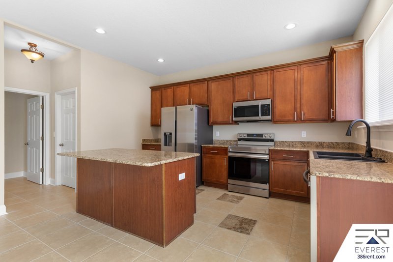 FULLY FENCED 5/2.5/2 IN DESIRABLE MATANZAS WOODS property image