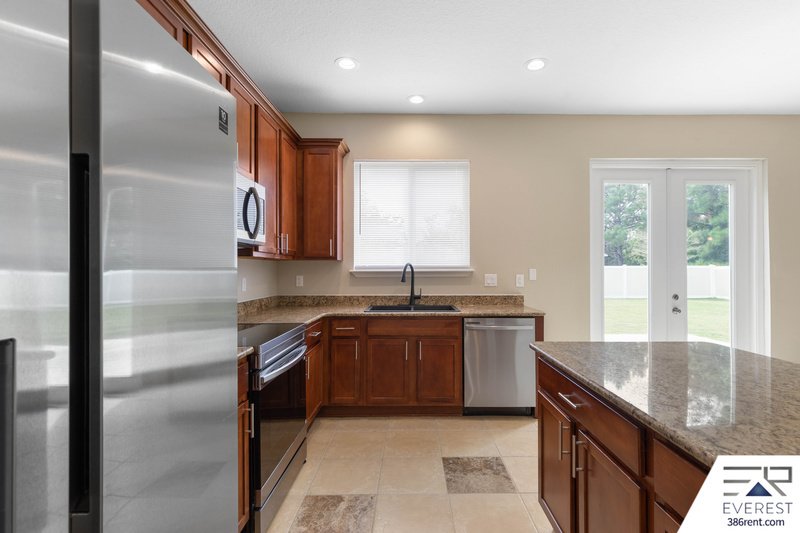 FULLY FENCED 5/2.5/2 IN DESIRABLE MATANZAS WOODS property image