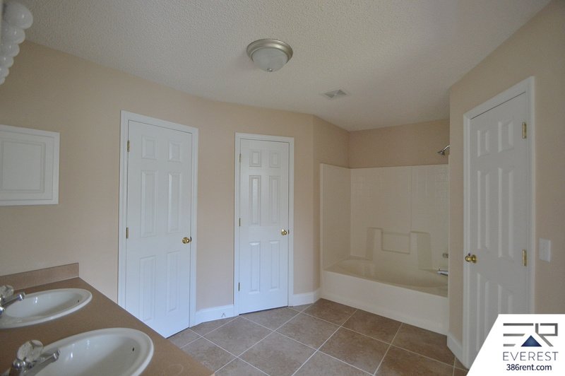 SPACIOUS 4/2/2 IN DESIRABLE MATANZAS WOODS property image
