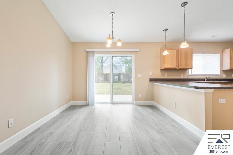 FULLY FENCED, LIKE NEW 3/2/1 IN POPULAR LEHIGH WOODS property image