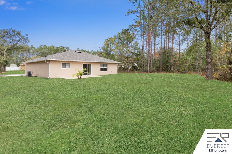 FULLY FENCED, LIKE NEW 3/2/1 IN POPULAR LEHIGH WOODS property image