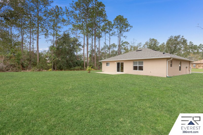 FULLY FENCED, LIKE NEW 3/2/1 IN POPULAR LEHIGH WOODS property image
