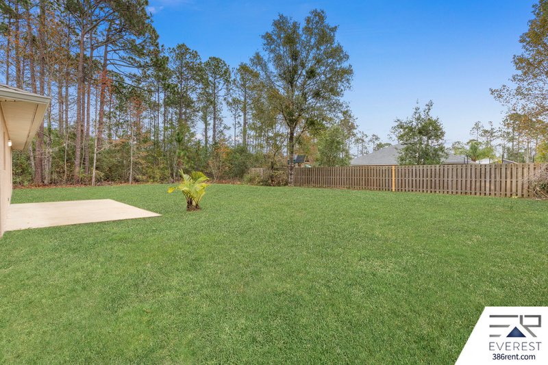 FULLY FENCED, LIKE NEW 3/2/1 IN POPULAR LEHIGH WOODS property image