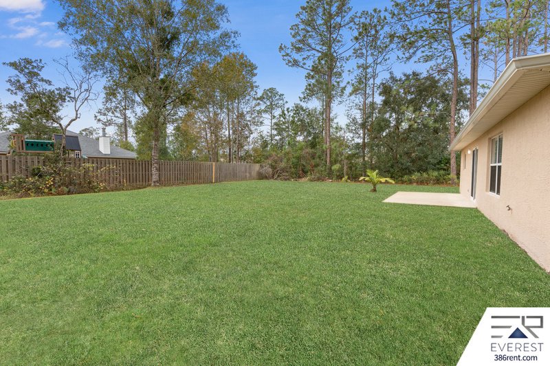 FULLY FENCED, LIKE NEW 3/2/1 IN POPULAR LEHIGH WOODS property image
