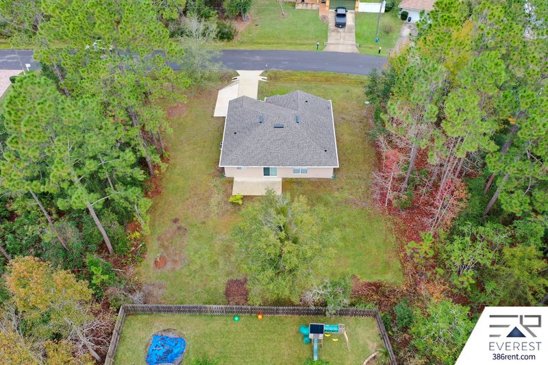 FULLY FENCED, LIKE NEW 3/2/1 IN POPULAR LEHIGH WOODS property image