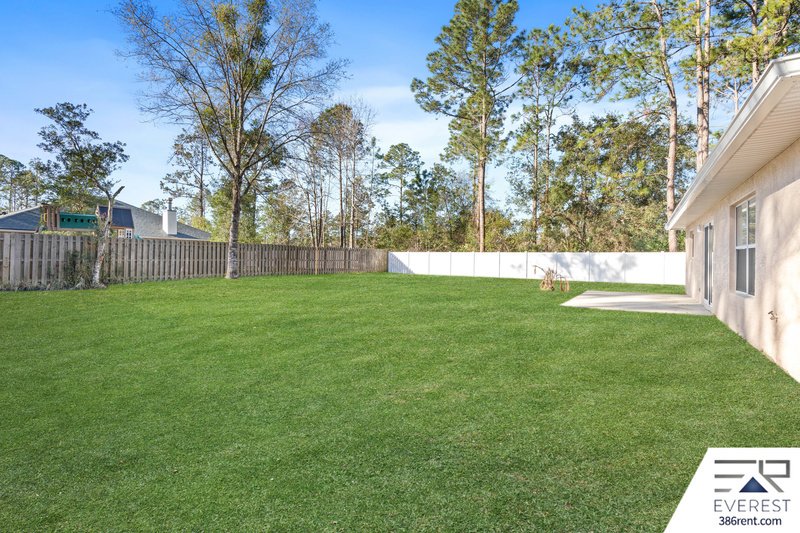 FULLY FENCED, LIKE NEW 3/2/1 IN POPULAR LEHIGH WOODS property image