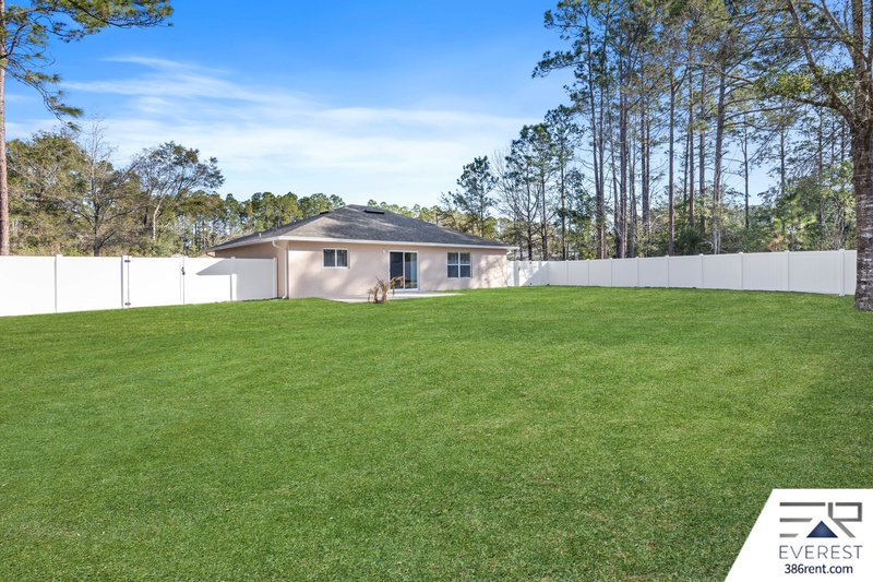 FULLY FENCED, LIKE NEW 3/2/1 IN POPULAR LEHIGH WOODS property image