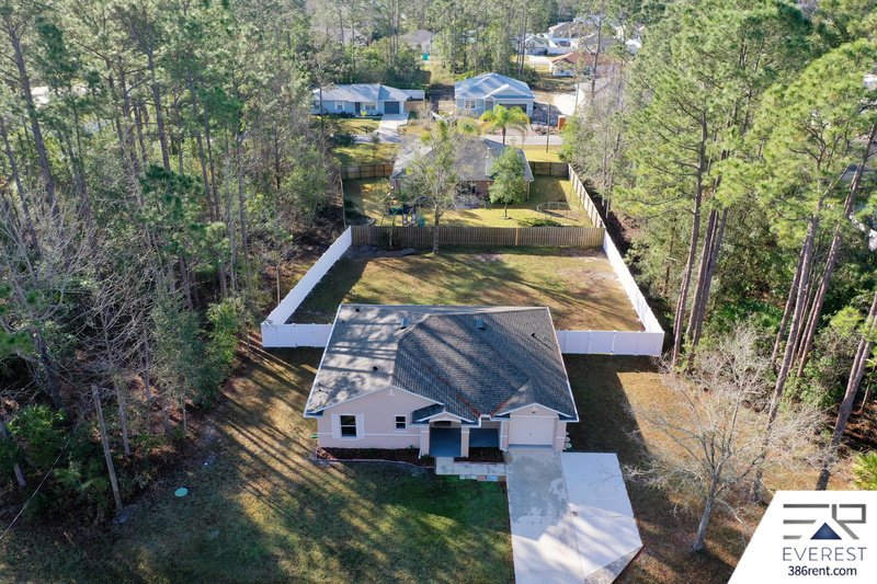 FULLY FENCED, LIKE NEW 3/2/1 IN POPULAR LEHIGH WOODS property image