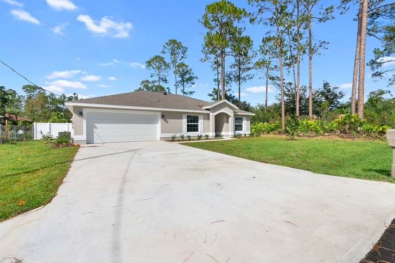 FULLY FENCED, LIKE NEW 4/2/2 IN THE HEART OF PALM COAST property image