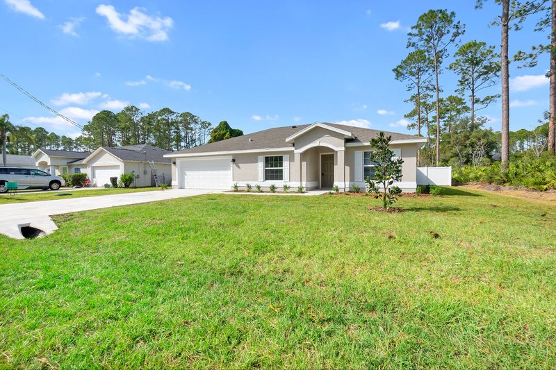 FULLY FENCED, LIKE NEW 4/2/2 IN THE HEART OF PALM COAST property image
