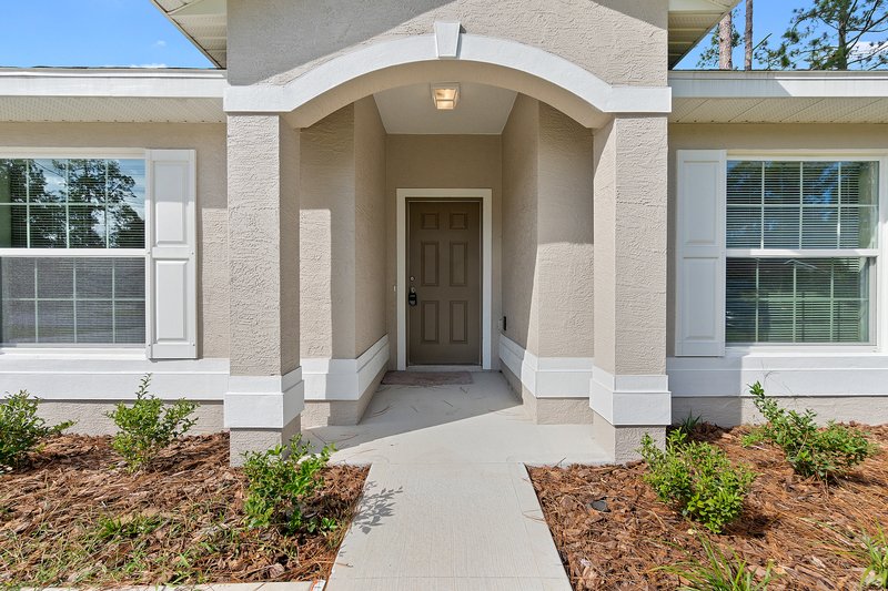 FULLY FENCED, LIKE NEW 4/2/2 IN THE HEART OF PALM COAST property image