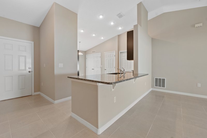 FULLY FENCED, LIKE NEW 4/2/2 IN THE HEART OF PALM COAST property image
