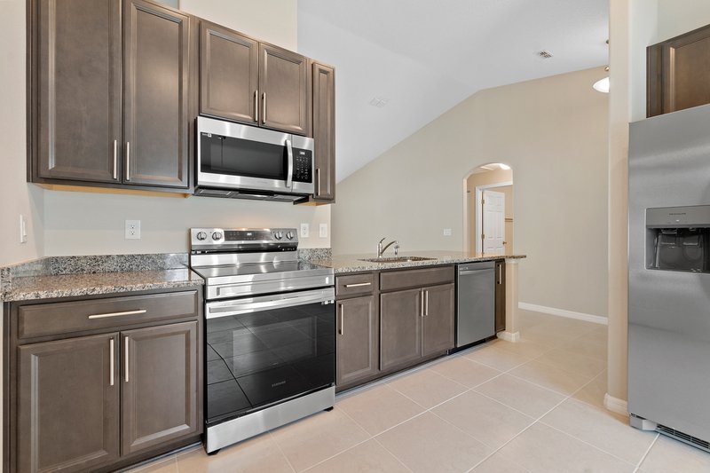 FULLY FENCED, LIKE NEW 4/2/2 IN THE HEART OF PALM COAST property image