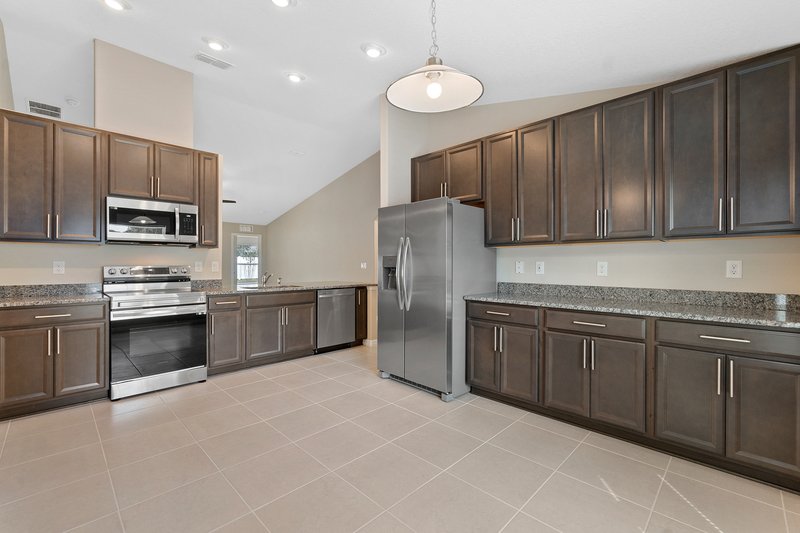 FULLY FENCED, LIKE NEW 4/2/2 IN THE HEART OF PALM COAST property image
