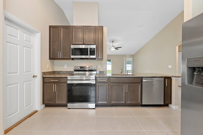 FULLY FENCED, LIKE NEW 4/2/2 IN THE HEART OF PALM COAST property image