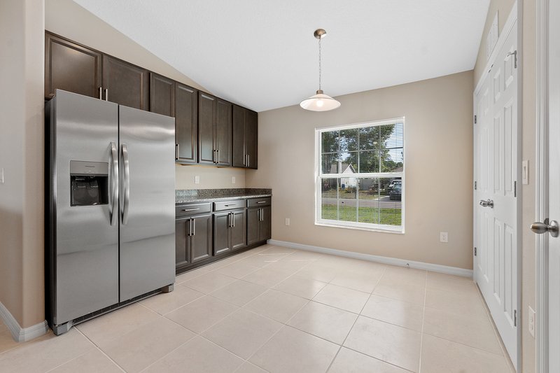 FULLY FENCED, LIKE NEW 4/2/2 IN THE HEART OF PALM COAST property image
