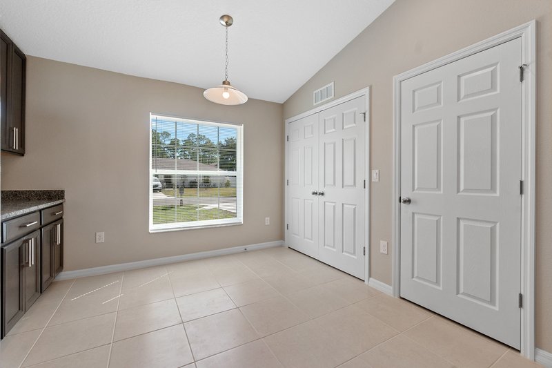 FULLY FENCED, LIKE NEW 4/2/2 IN THE HEART OF PALM COAST property image