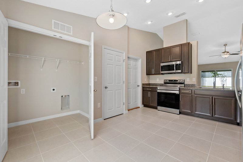 FULLY FENCED, LIKE NEW 4/2/2 IN THE HEART OF PALM COAST property image