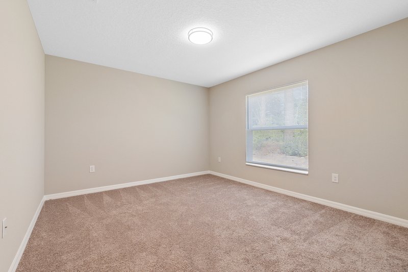 FULLY FENCED, LIKE NEW 4/2/2 IN THE HEART OF PALM COAST property image