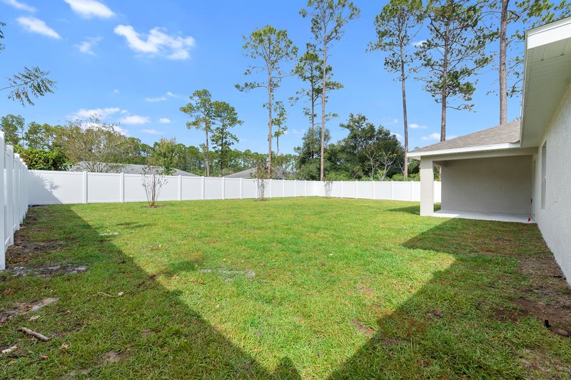 FULLY FENCED, LIKE NEW 4/2/2 IN THE HEART OF PALM COAST property image