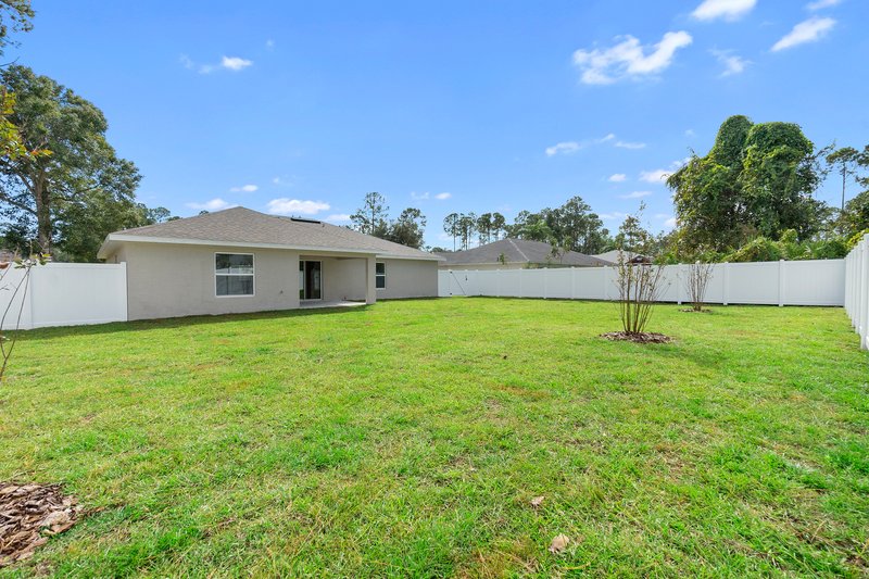 FULLY FENCED, LIKE NEW 4/2/2 IN THE HEART OF PALM COAST property image