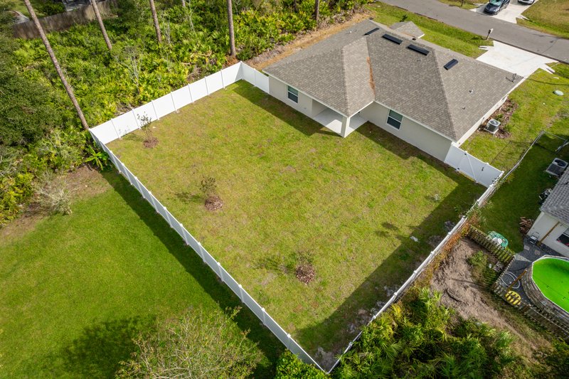 FULLY FENCED, LIKE NEW 4/2/2 IN THE HEART OF PALM COAST property image